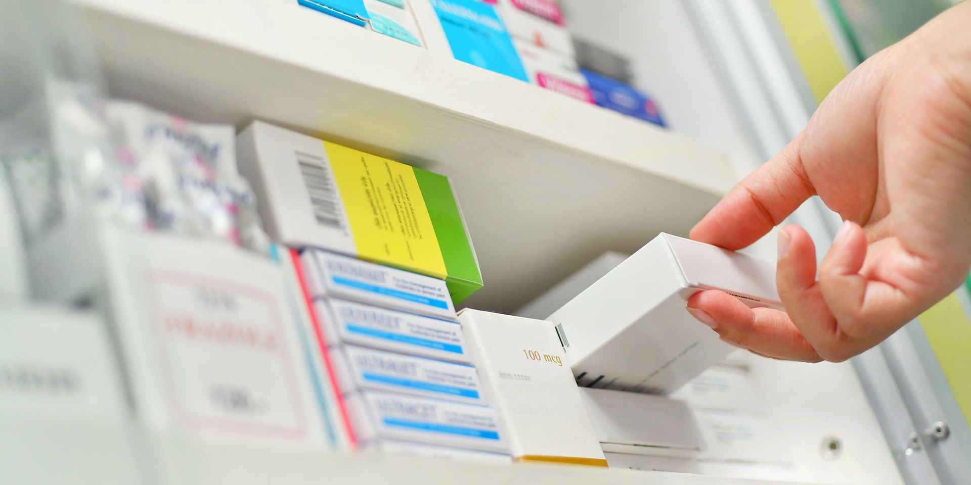 Pharmacist using dispensing labels